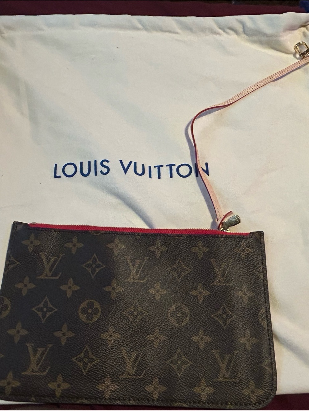 Louis Vuitton Monogram Canvas Wristlet Pouch in Brown